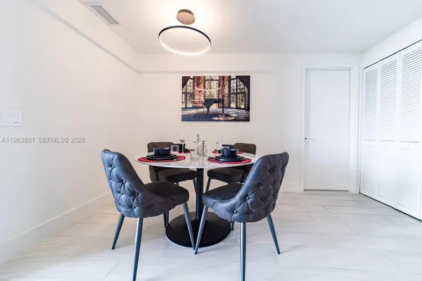 a view of a dining room with furniture