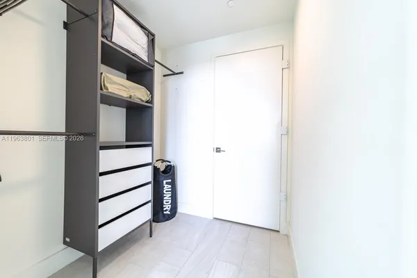 a view of front door with wooden floor