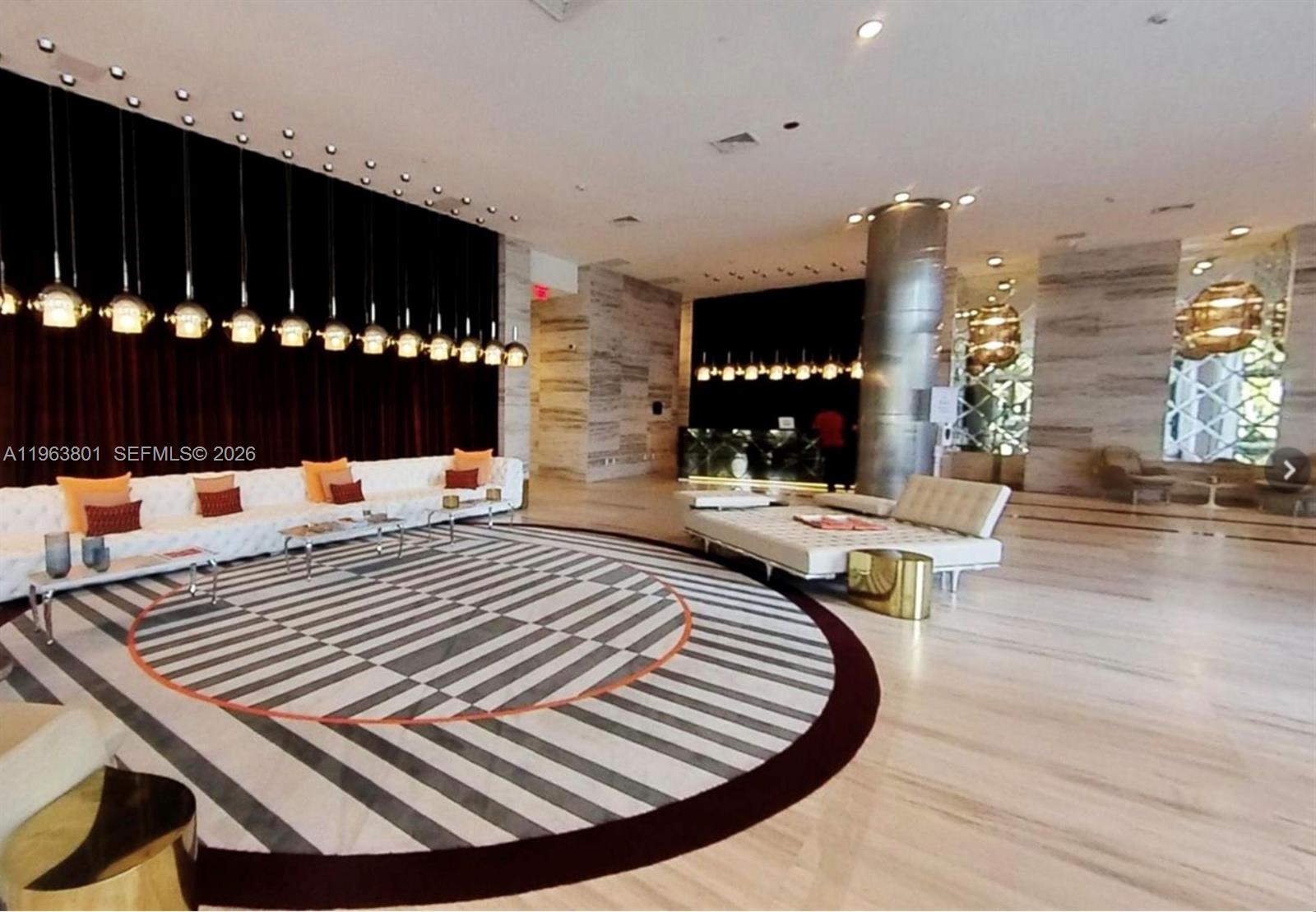 2000 Metropica Way, Unit 806 Sunrise, FL 33323 - Photo 31 of 47 a living room with furniture