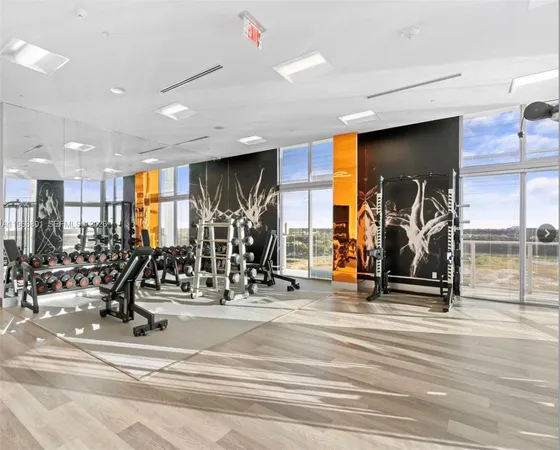 a view of a room with gym equipment