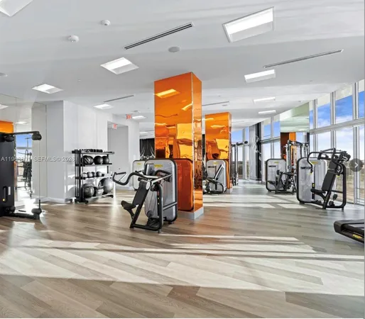 a view of a swimming pool and dining room