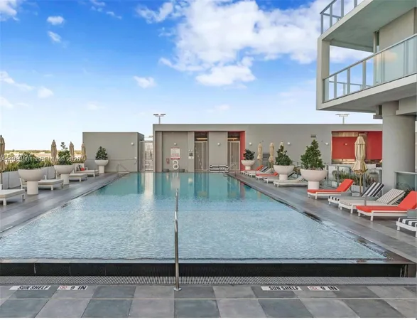 a view of roof deck with patio