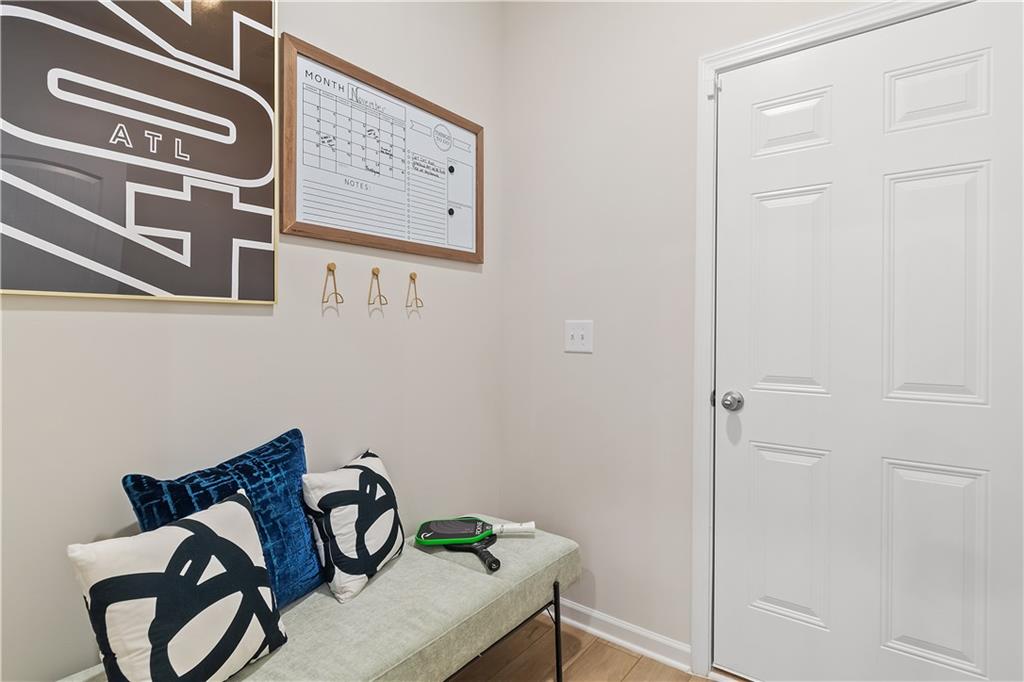 8203 Tiger Way Riverdale, GA 30296 - Photo 16 of 37 a view of a door and chair in a room