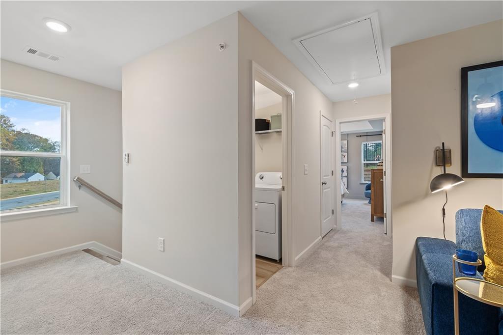 8203 Tiger Way Riverdale, GA 30296 - Photo 18 of 37 wooden floor in an empty room and a window
