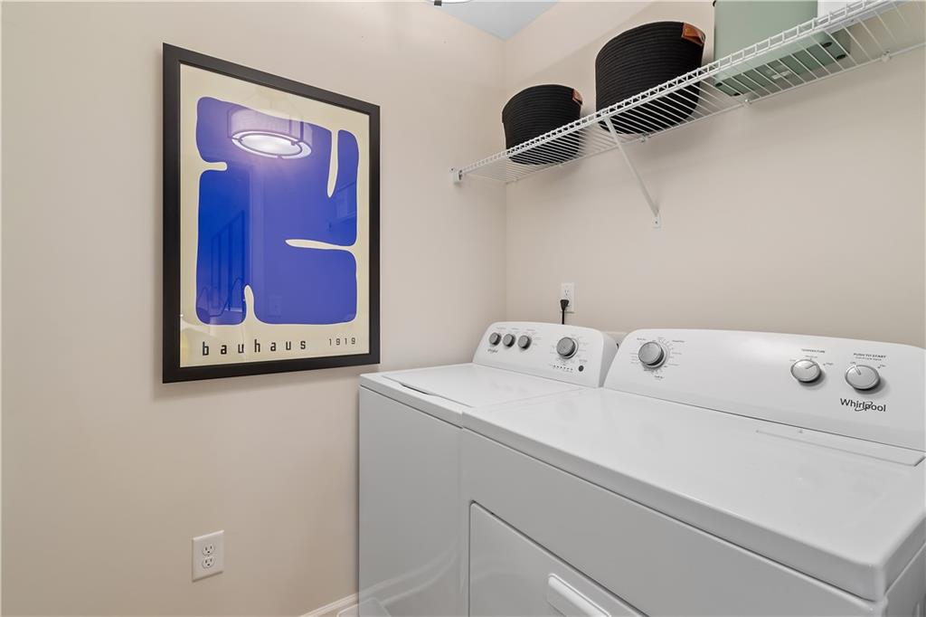 8203 Tiger Way Riverdale, GA 30296 - Photo 25 of 37 a utility room with dryer and washer