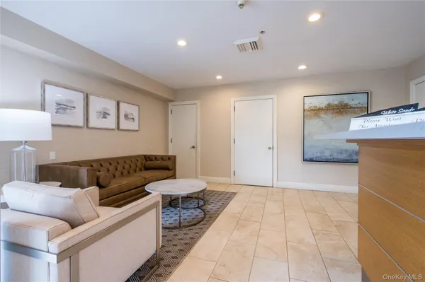 a living room with a couch and a coffee table