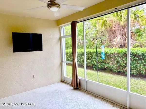 a view of a room with a large window