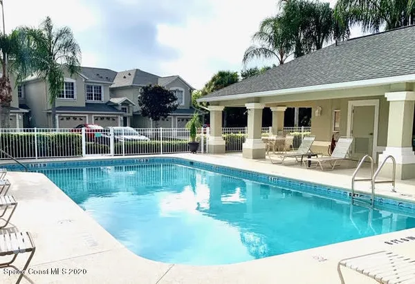 a view of a house with a swimming pool