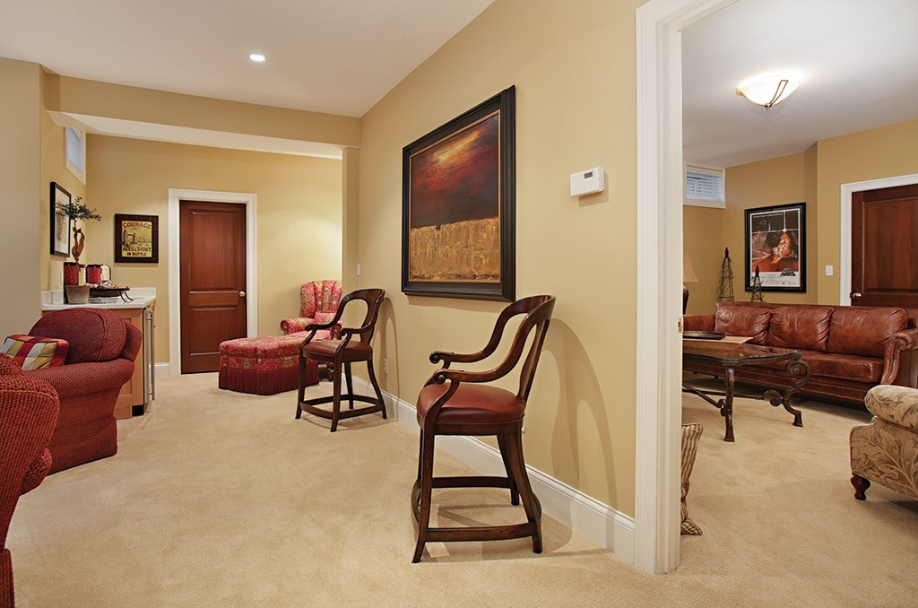 342 Woodland Road Brookline, MA 02467 - Photo 12 of 15 a living room with furniture and a flat screen tv