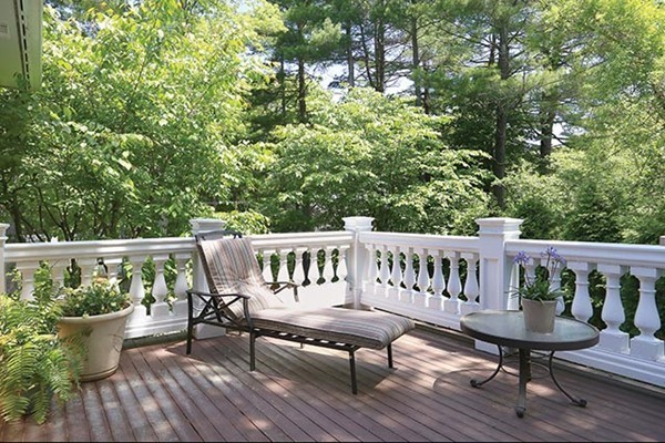 342 Woodland Road Brookline, MA 02467 - Photo 13 of 15 a view of a deck with furniture and wooden floor