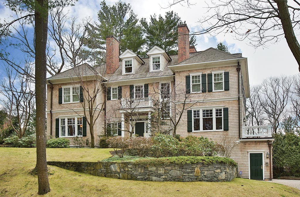 342 Woodland Road Brookline, MA 02467 - Photo 2 of 15 a front view of a residential apartment building with a yard