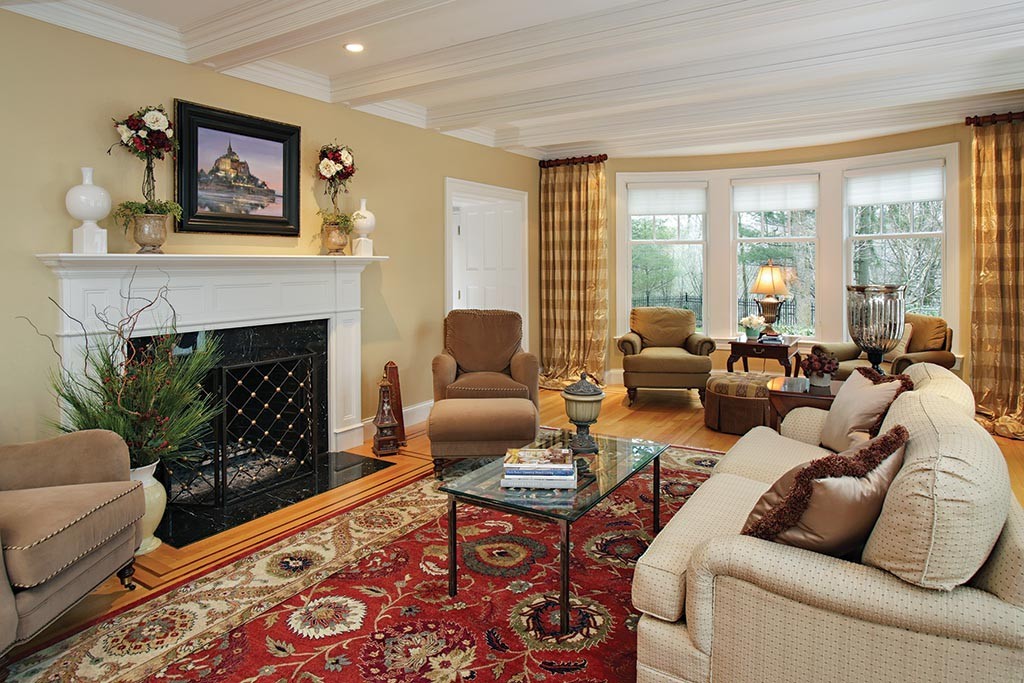 342 Woodland Road Brookline, MA 02467 - Photo 3 of 15 a living room with furniture and a fireplace