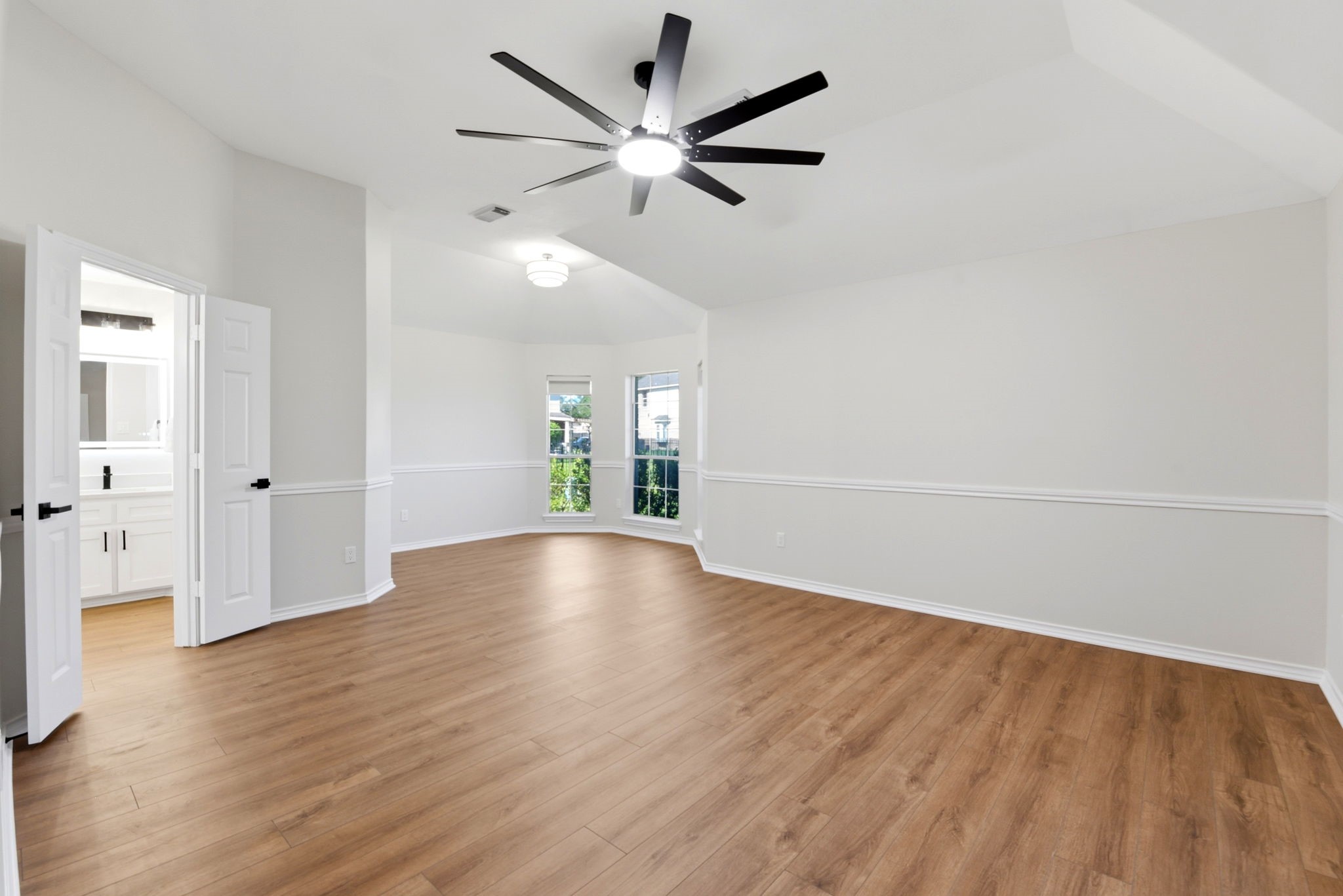 29819 South Legends Village Circle Spring, TX 77386 - Photo 25 of 48 wooden floor in an empty room with a window