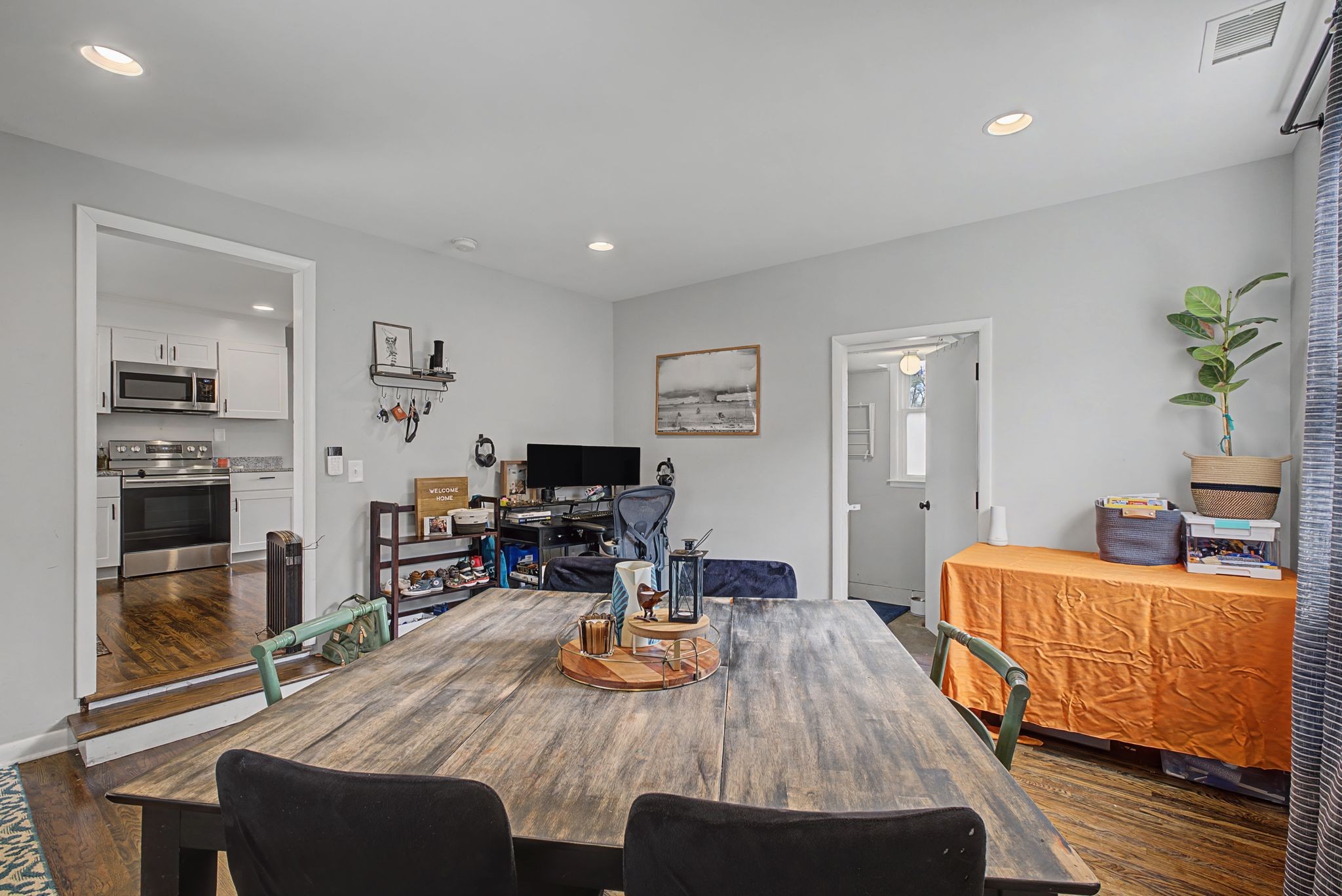 820 Allen Road Nashville, TN 37214 - Photo 12 of 28 a dining room with furniture and a kitchen view