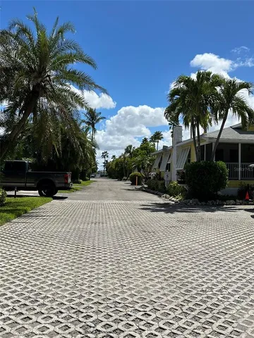a view of a balcony with chairs