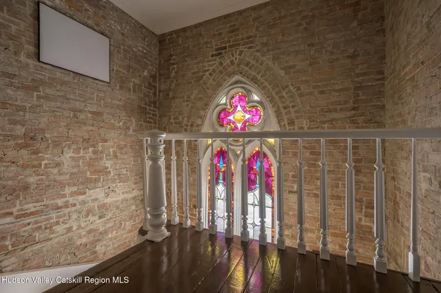 a bedroom with a bed and a walk in closet