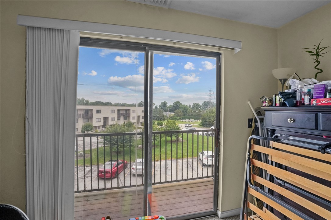 196 Old River Road, Unit 166 Lincoln, RI 02865 - Photo 12 of 20 Bedroom #1 with sliders to a porch