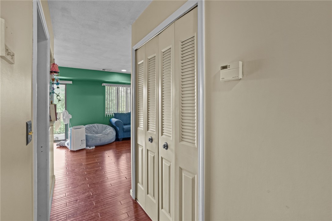 196 Old River Road, Unit 166 Lincoln, RI 02865 - Photo 10 of 20 Storage closet - hallway to living room and to bedrooms