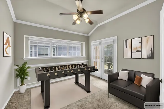 a bedroom with furniture and a window