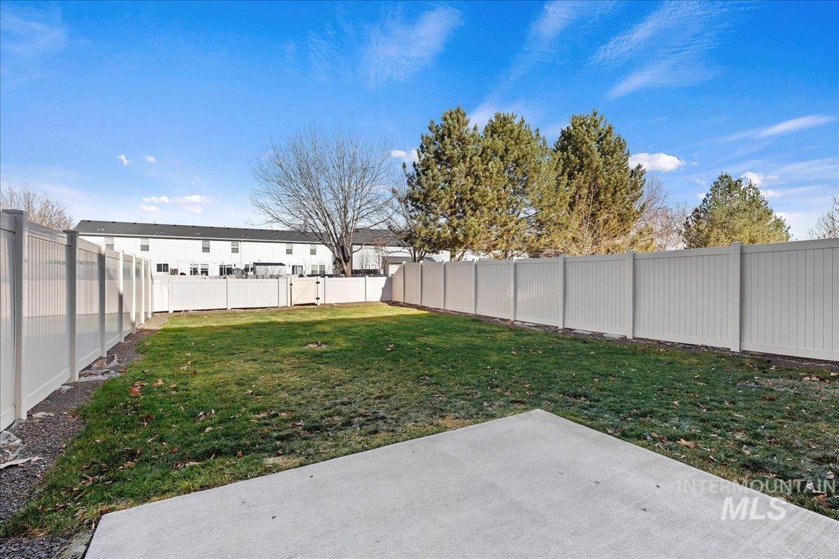 926 West Woodpine Street Meridian, ID 83646 - Photo 30 of 32 Fenced backyard featuring a patio area