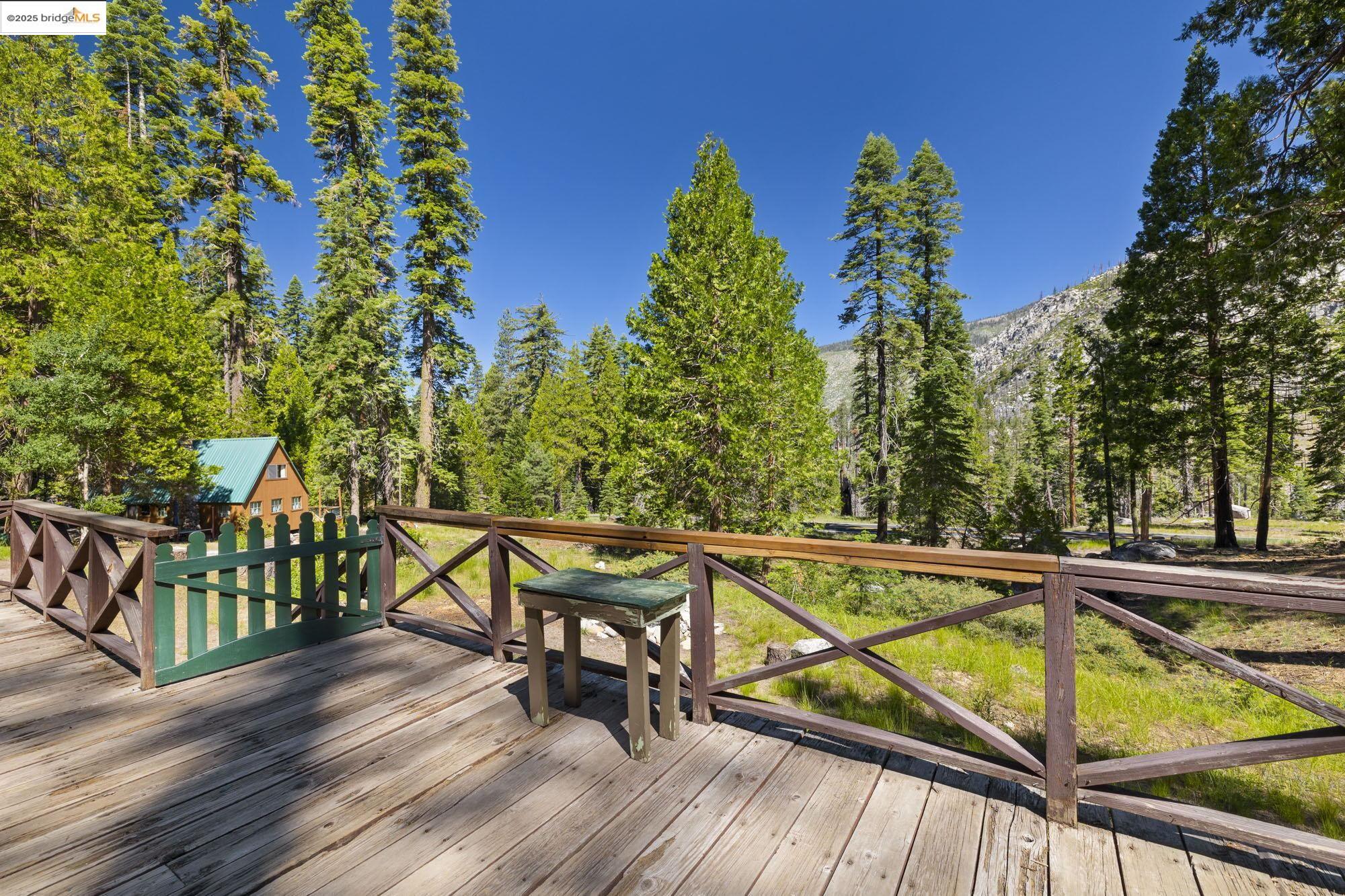 7 Riverside Tract Kyburz, CA 95720 - Photo 23 of 36 a view of a balcony with chairs