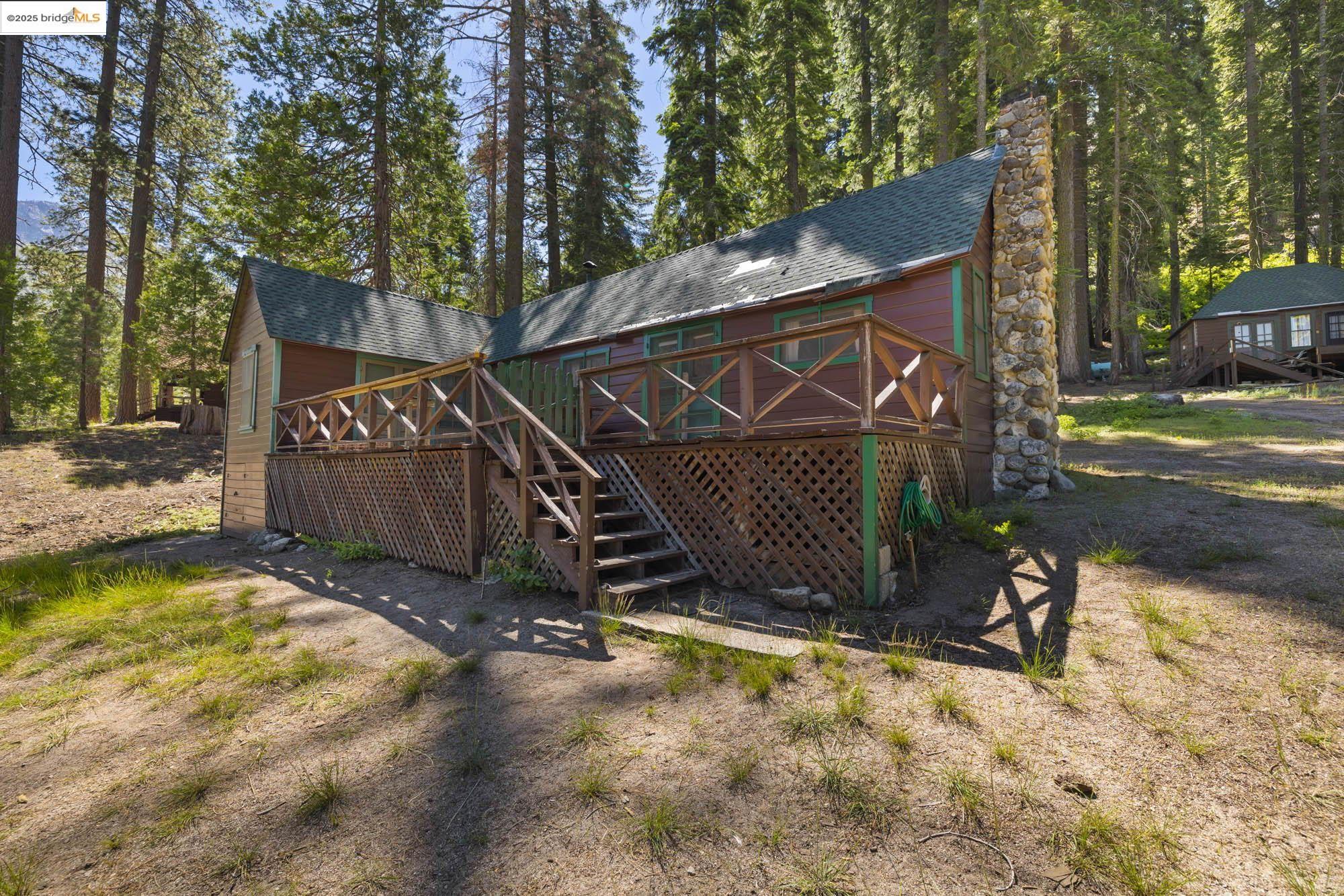 7 Riverside Tract Kyburz, CA 95720 - Photo 25 of 36 a view of outdoor space and deck