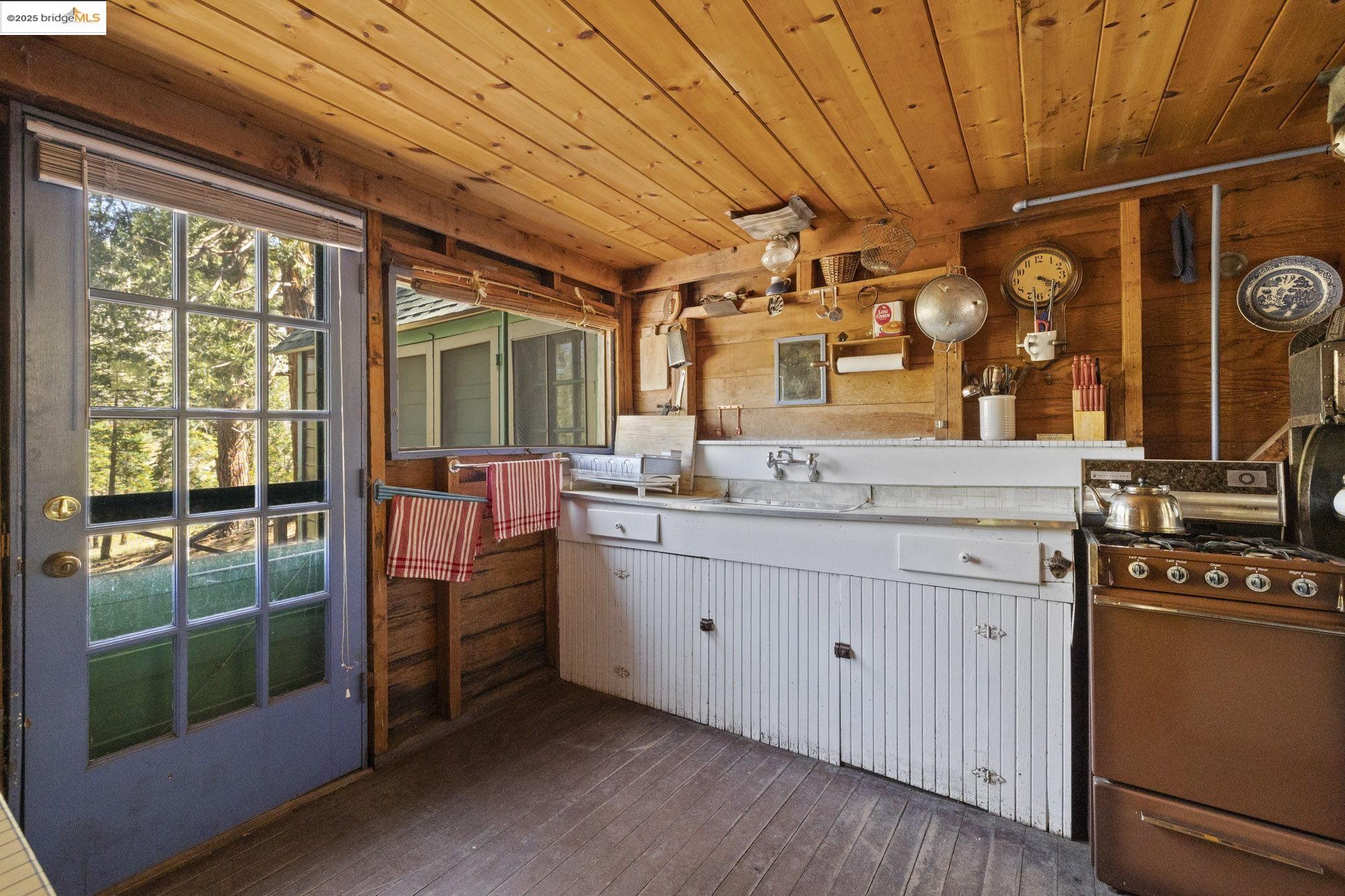 7 Riverside Tract Kyburz, CA 95720 - Photo 3 of 36 a bathroom with a sink and a mirror