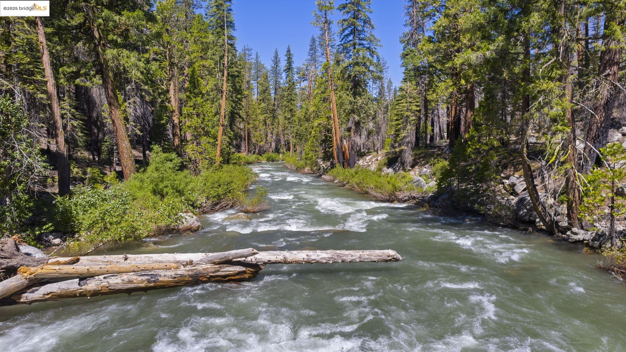 7 Riverside Tract Kyburz, CA 95720 - Photo 33 of 36 a view of a lake with houses