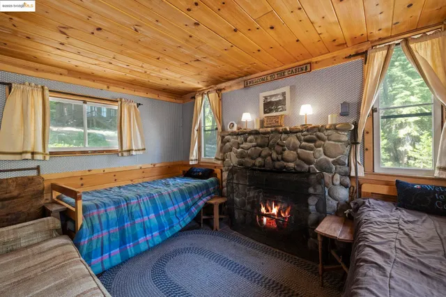 a room with furniture fireplace and window