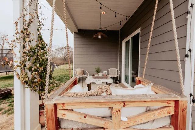 a view of a house with a tree