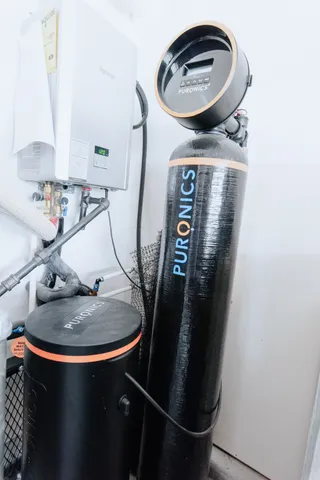 a bathroom with a sink and mirror