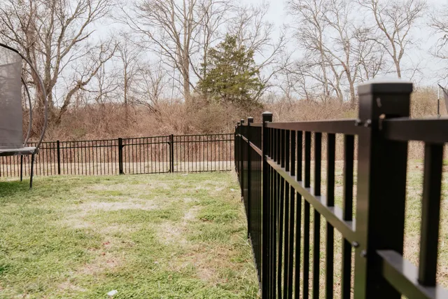 a view of a backyard with furniture