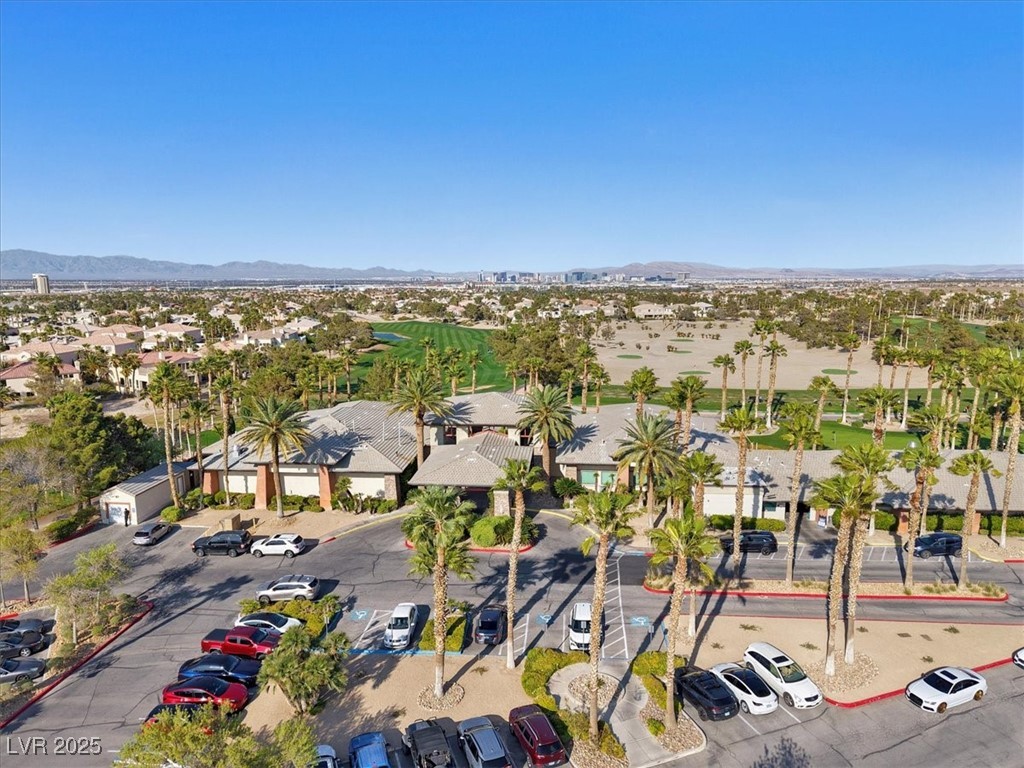 319 Fox Lake Avenue Las Vegas, NV 89148 - Photo 12 of 39 Aerial perspective of suburban area with a mountain backdrop