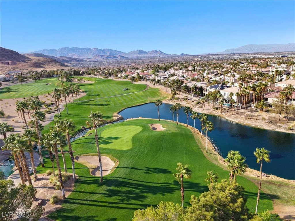 319 Fox Lake Avenue Las Vegas, NV 89148 - Photo 13 of 39 Aerial perspective of suburban area with a local golf course and a water and mountain view