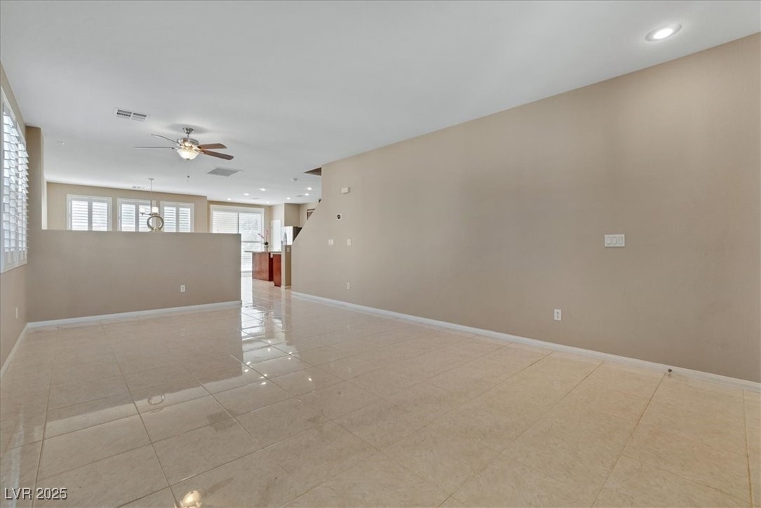319 Fox Lake Avenue Las Vegas, NV 89148 - Photo 18 of 39 Unfurnished room featuring recessed lighting, light tile patterned flooring, and ceiling fan