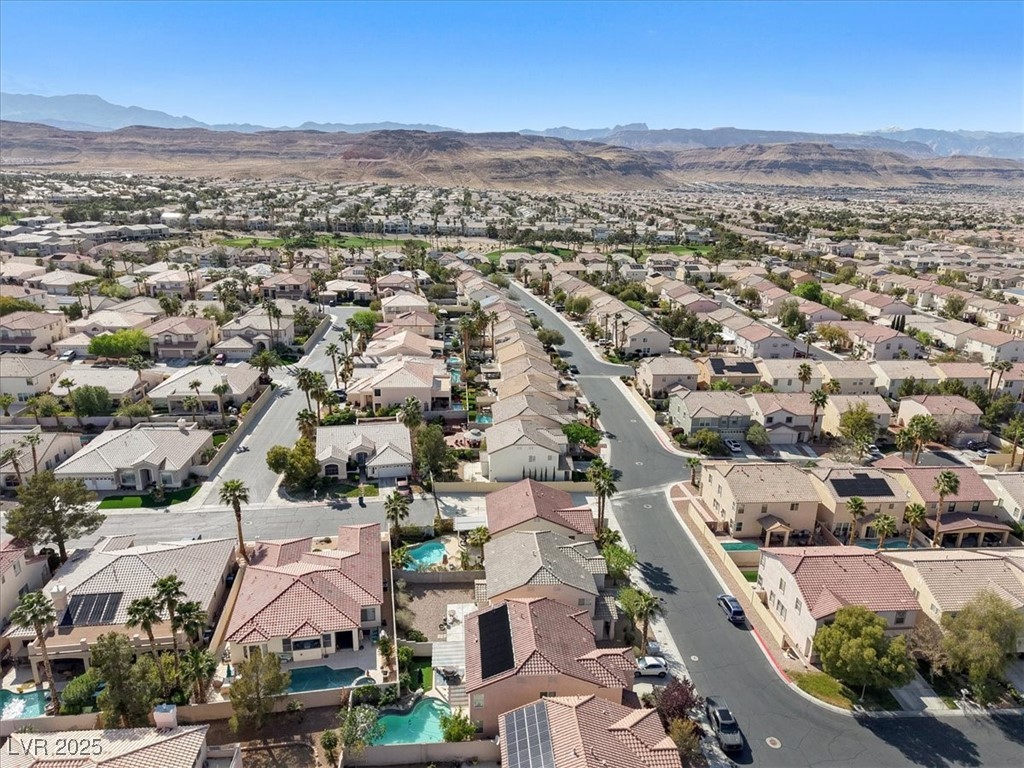 319 Fox Lake Avenue Las Vegas, NV 89148 - Photo 4 of 39 Drone / aerial view of a mountain backdrop