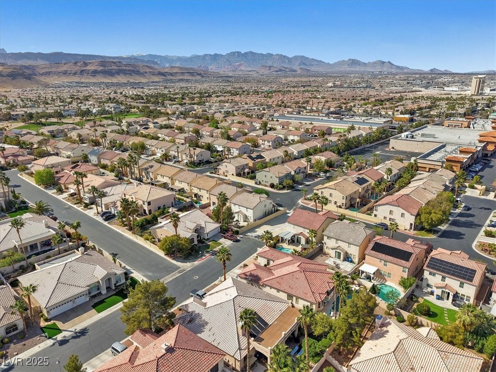 319 Fox Lake Avenue Las Vegas, NV 89148 - Photo 5 of 39 Aerial view of property and surrounding area with a mountain backdrop