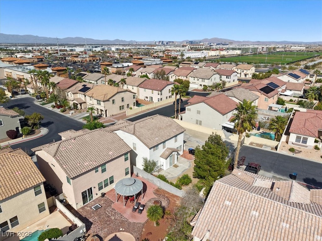 319 Fox Lake Avenue Las Vegas, NV 89148 - Photo 9 of 39 Aerial perspective of suburban area featuring mountains