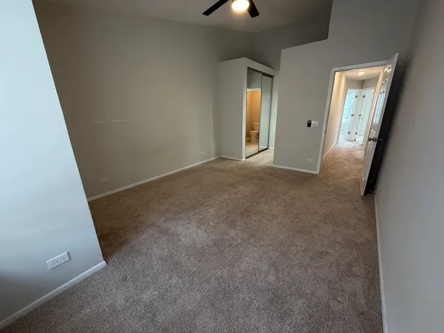 an empty room with a bathroom