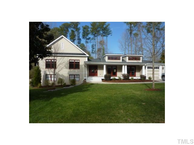4513 Pitt Street Raleigh, NC 27609 - Photo 1 of 17 a black and white photo of a house