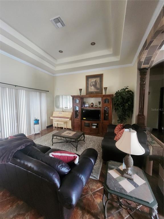 2930 Marsh Road DeLand, FL 32724 - Photo 11 of 30 a living room with furniture and a fireplace