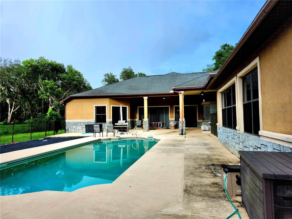 2930 Marsh Road DeLand, FL 32724 - Photo 20 of 30 a front view of house with yard and outdoor seating