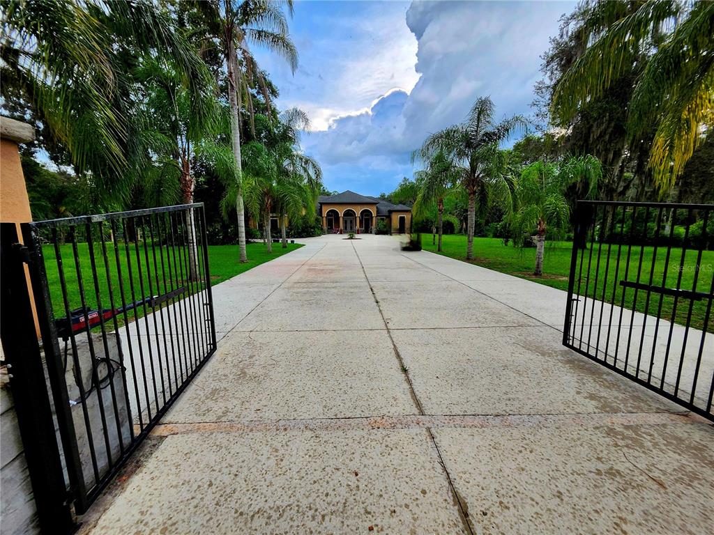 2930 Marsh Road DeLand, FL 32724 - Photo 2 of 30 a view of a garden and pathway
