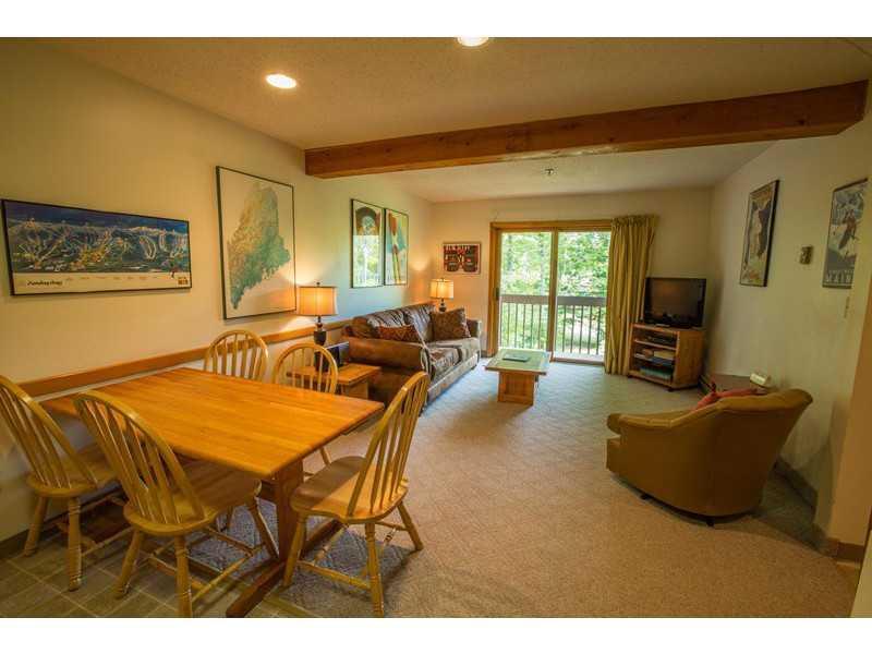 8 Moonstruck Drive, Unit B112 Newry, ME 04261 - Photo 5 of 15 Dining Room. Dining area and living...