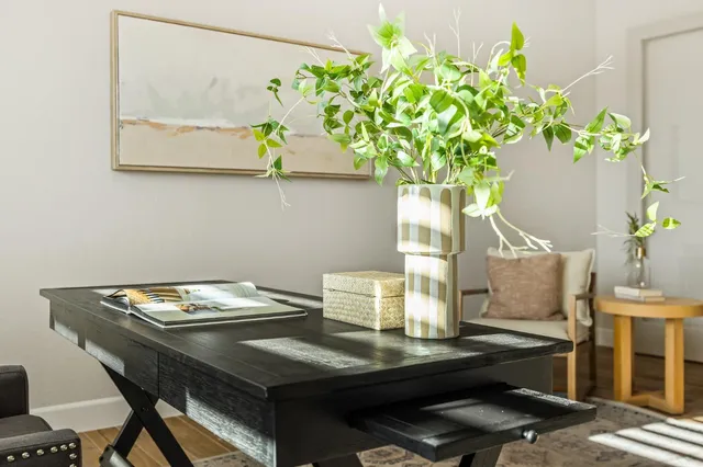 a bathroom with a shower and a sink