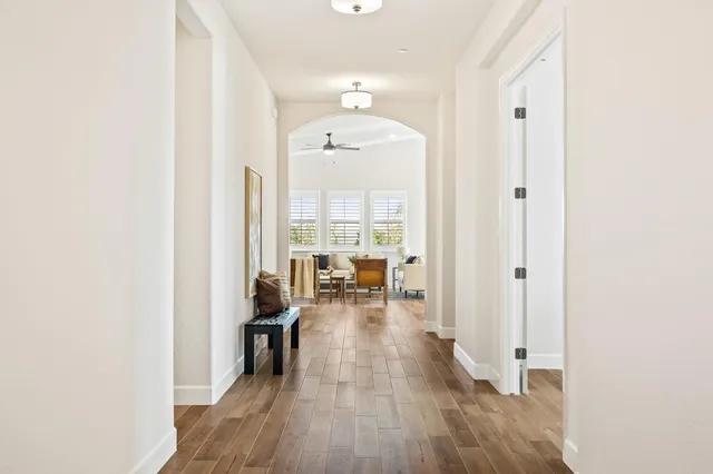 a very nice looking dining room with a table and chairs