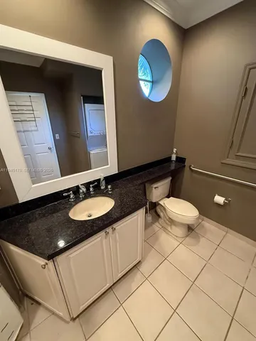 a big room with closet and a ceiling fan