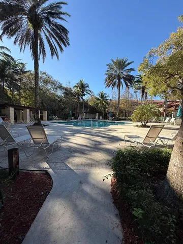 a view of a garden with trees