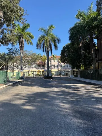 a view of a room with a furniture and floor to ceiling window