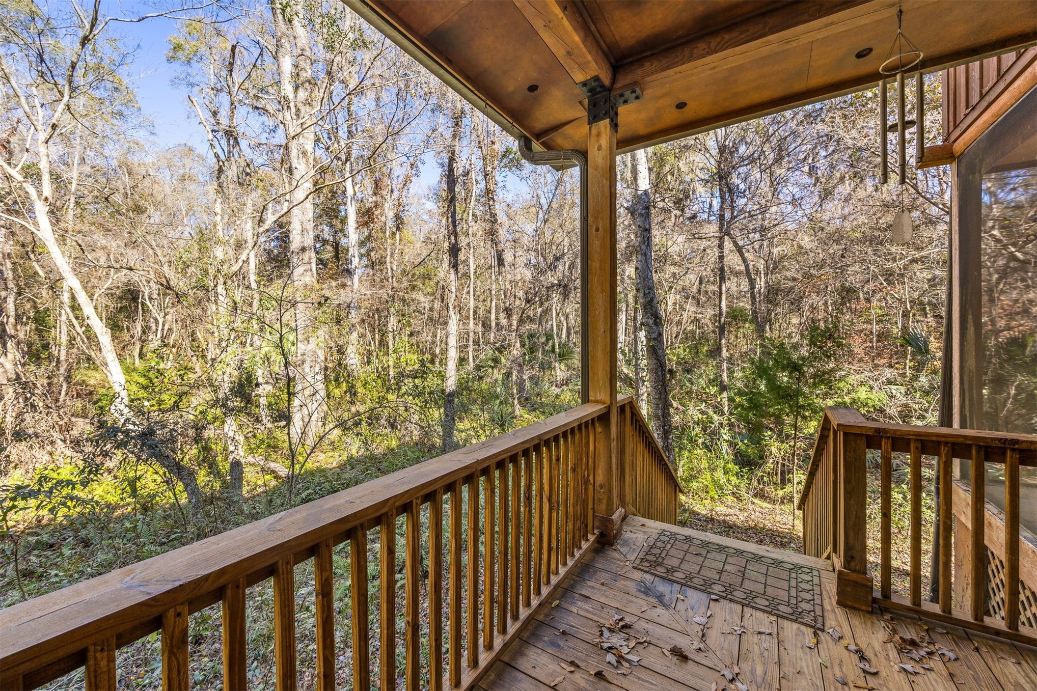 86205 Pages Dairy Road Yulee, FL 32097 - Photo 40 of 56 a view of balcony with wooden floor